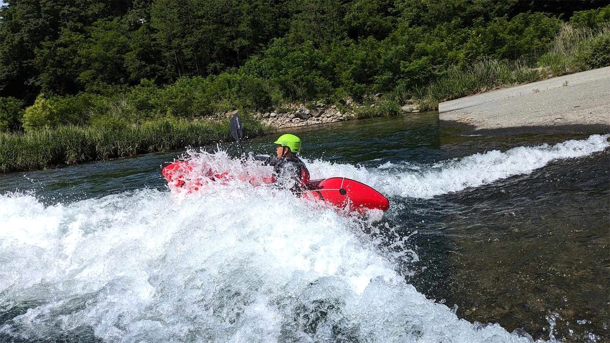 Gunma Pack Raft paddling through whitewater