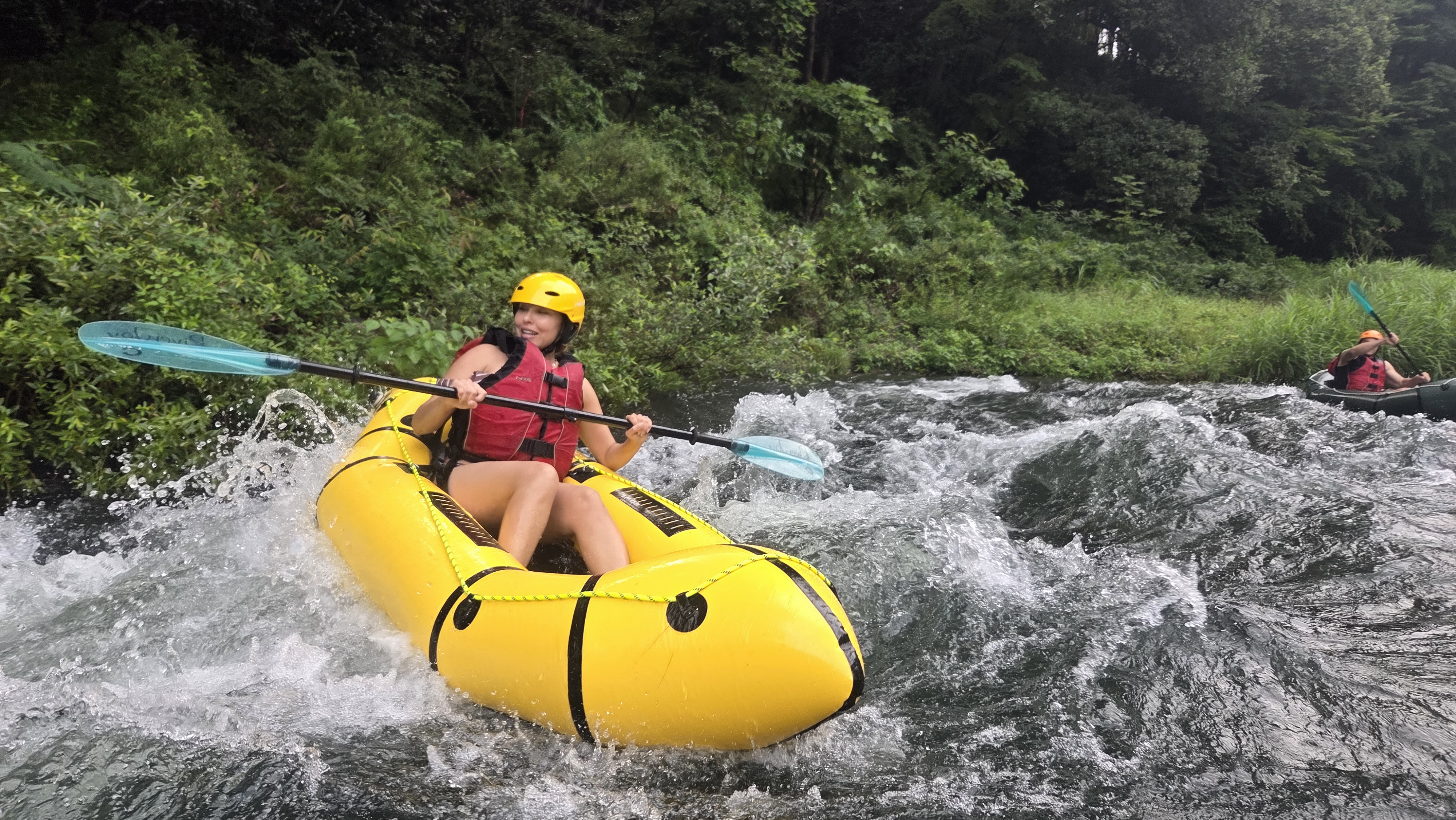 Tokyo Pack Raft summer adventure on the Tama River near Mitake with a guest paddling through clear whitewater